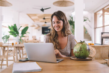Woman working on laptop in Bali