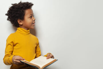 Child holding a book