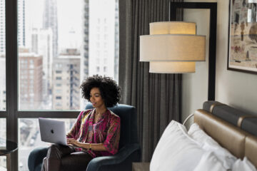 Woman Working from Hyatt hotel