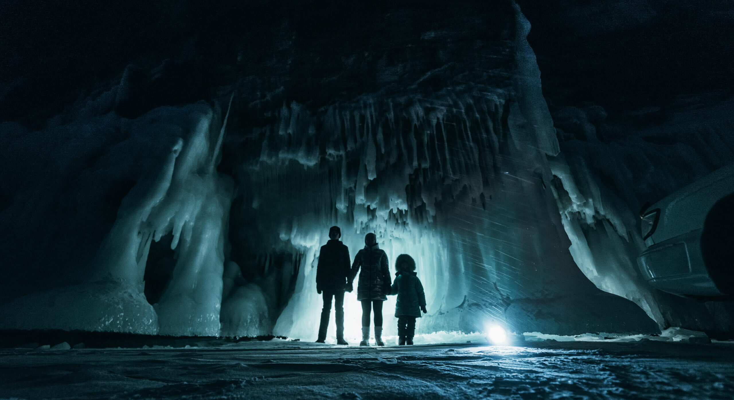 Family in ice cave