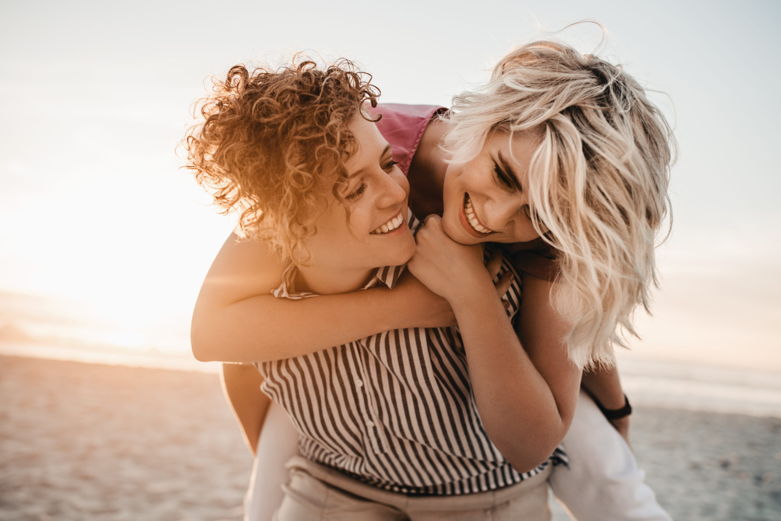 Female couple on beach