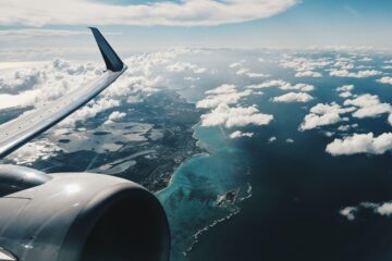 Plane flying over sea