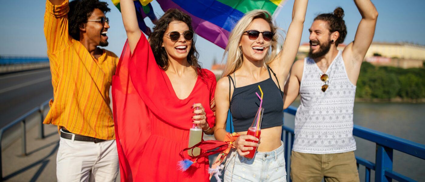 LGBTQ people with pride flag